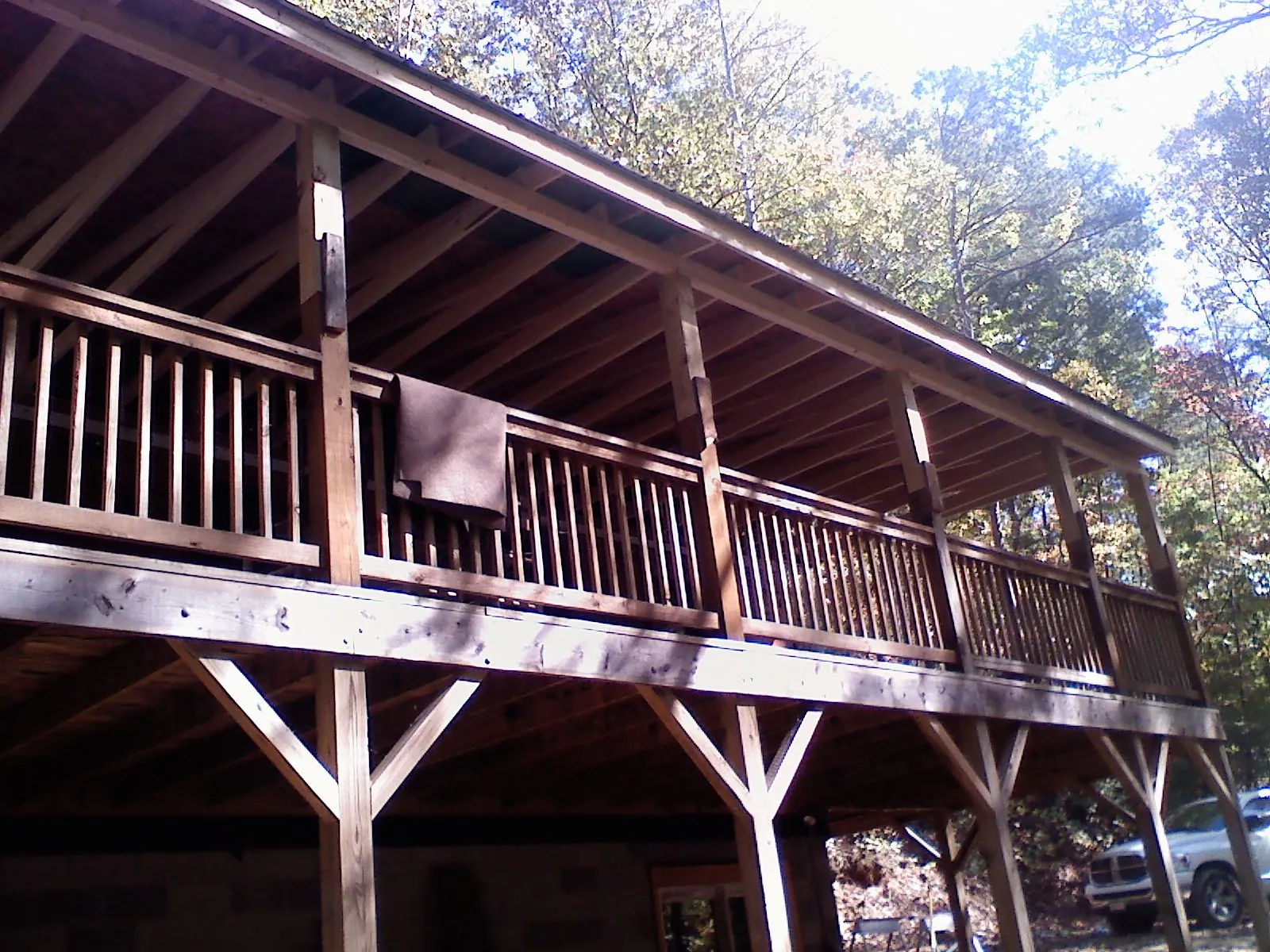 Timber framing under a new elevated porch and deck — Roof Leak Repair in Vass by Roofing Brothers